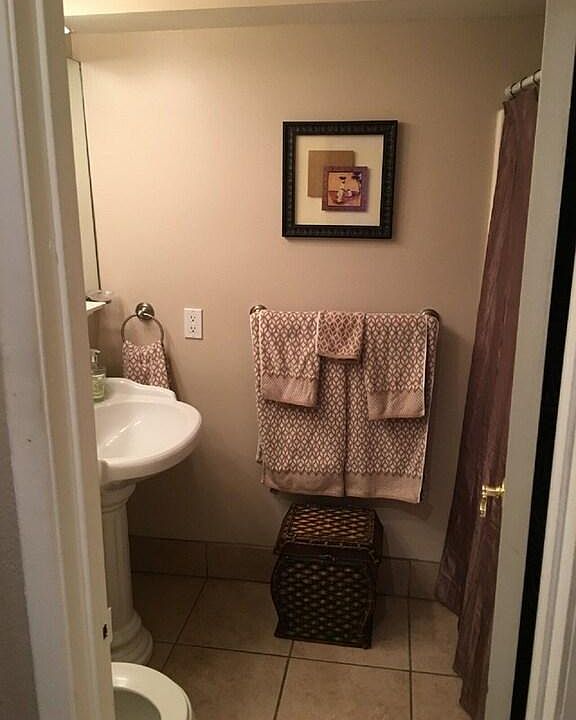 Brand new lighting, towels, shower head, toilet seat and bathmat.