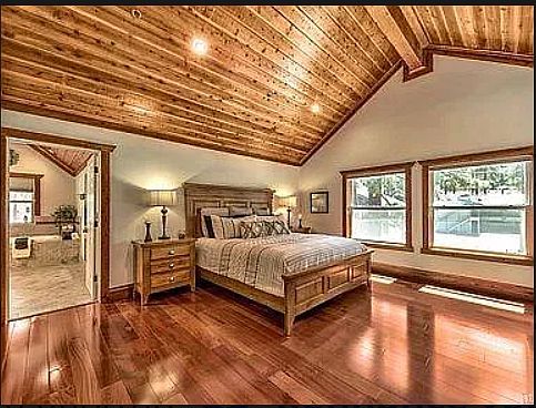 This spacious master bedroom on the third floor features a luxurious bathroom with a walk-in shower and a generous closet