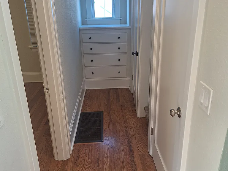 Built in drawers outside of lower bath across from 1st floor bedroom