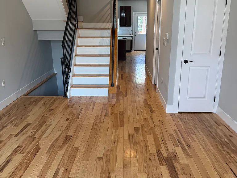 Living room/entry with coat closet
