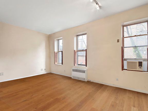 5th image of 131 E 19th St APT 3