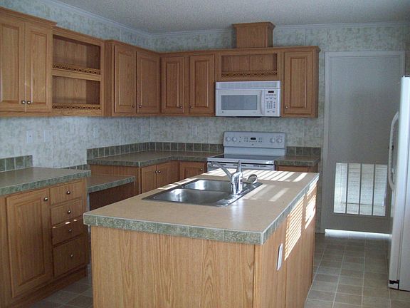 lots of cabinets and room for a kitchen table