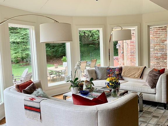 Cheery and bright sunroom off kitchen and LR