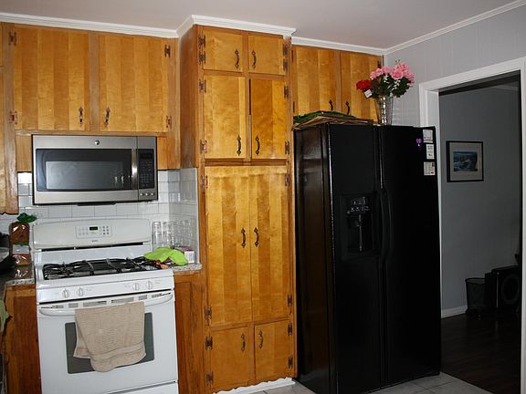 Spacious kitchen with lots of storage. Tile floors and granite counters.
