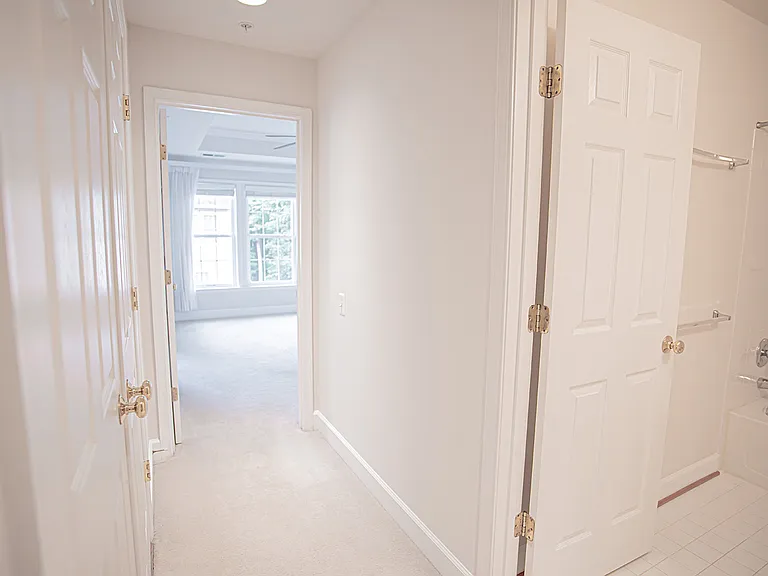 Walking Up the 3rd level, with Master Bedroom straight ahead, guest bathroom on the right and laundry room on the left
