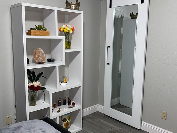 Guest bedroom #1 with modern sliding barn door