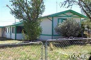 Front of house; enclosed porch on left