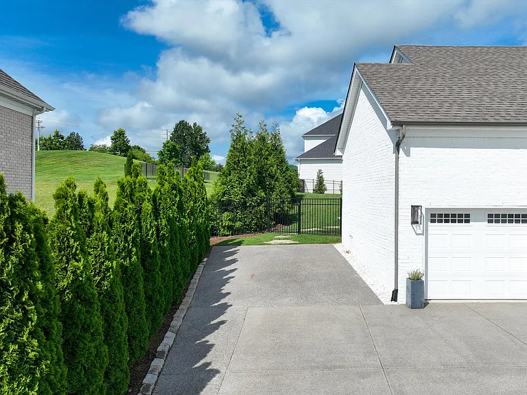 Additional driveway and access to backyard