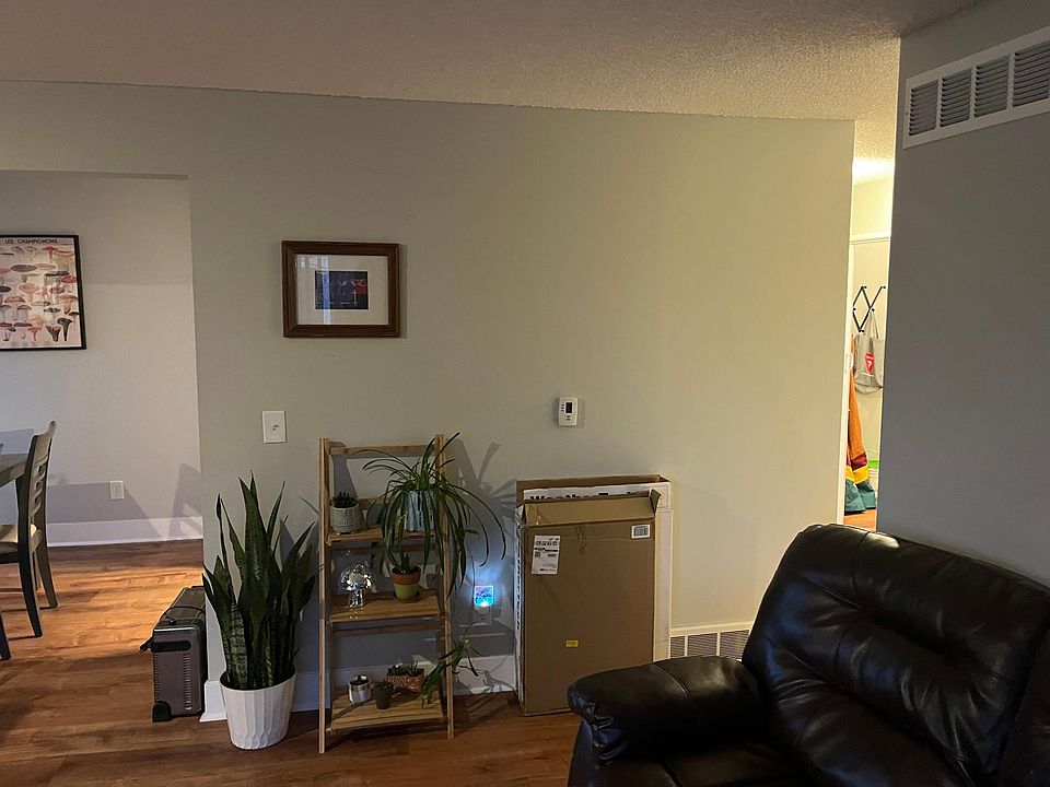 living room looking into dining room on left