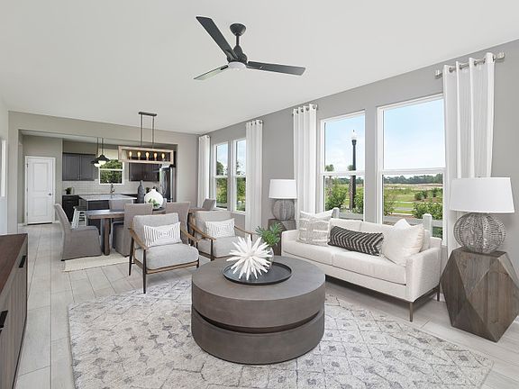 Open gathering room perfect for lounging and hosting. - Model Representation