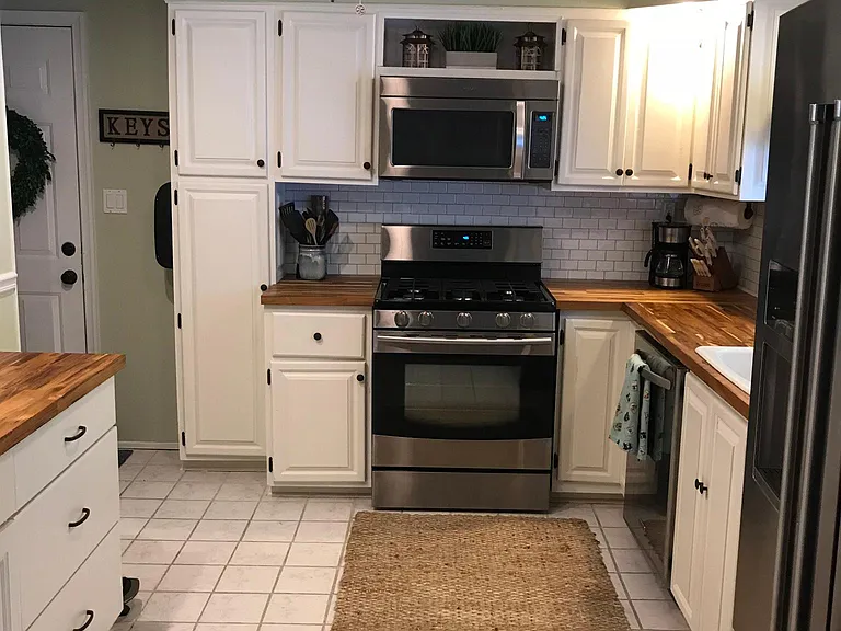 Renovated kitchen. Brand new butcher block counters, stainless steel appliances