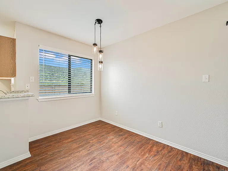 Cozy dining area with seamless flow into the fully equipped kitchen.