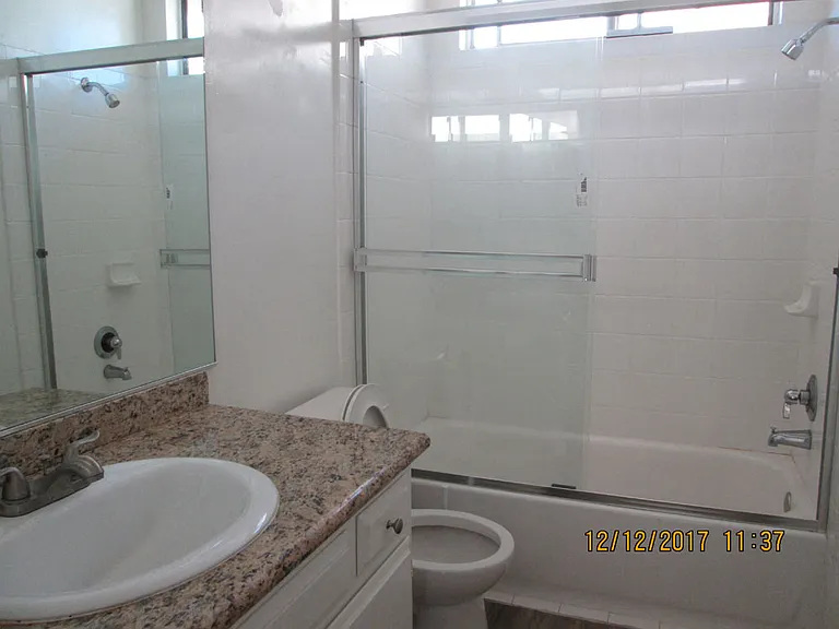 Lido Apartments - 3339 S Canfield Ave — Photo 9