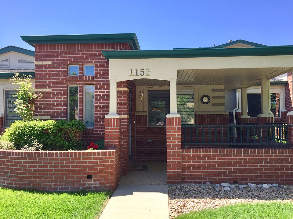 1152 Ulysses St entrance, porch and raised garden bed.
