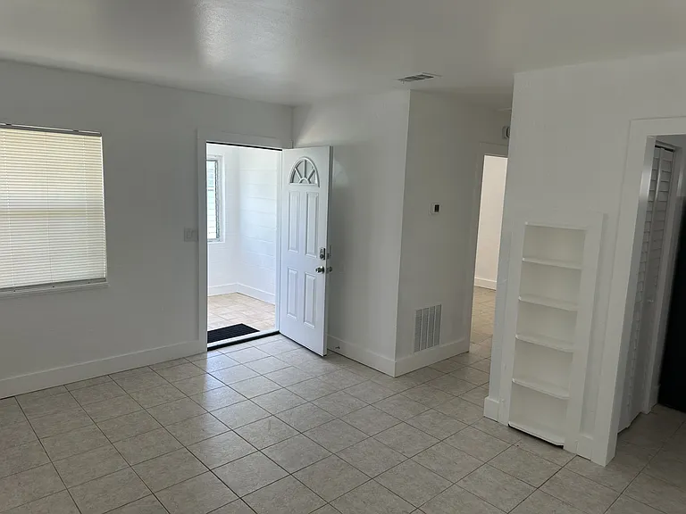 Open living room area - Built-in bookcase