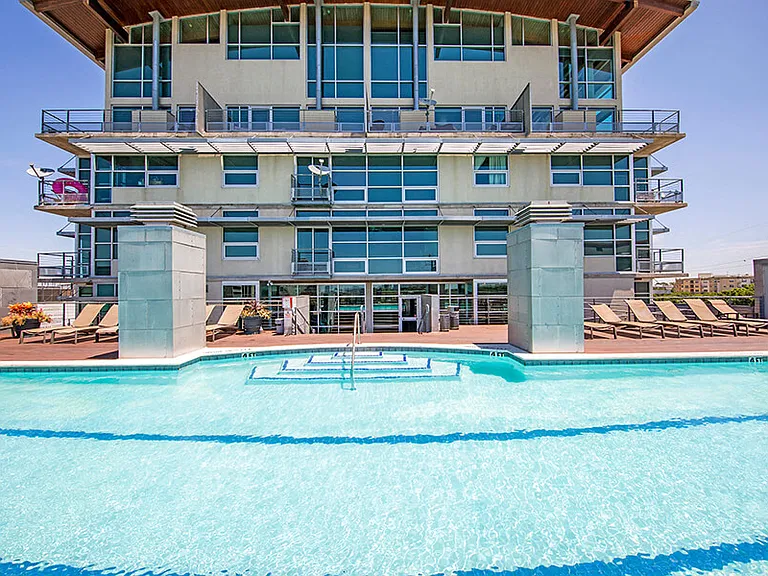 Olympic style swimming pool with sun loungers