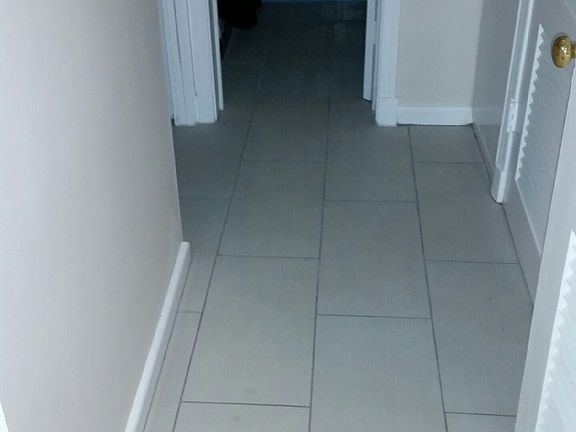 Hallway to 1st fl bathroom and laundry