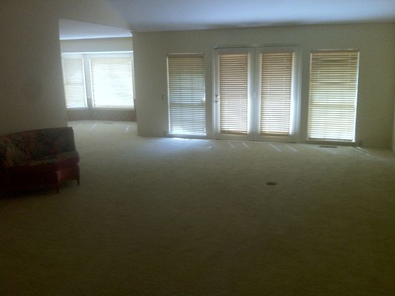 Large den, fireplace, natural light