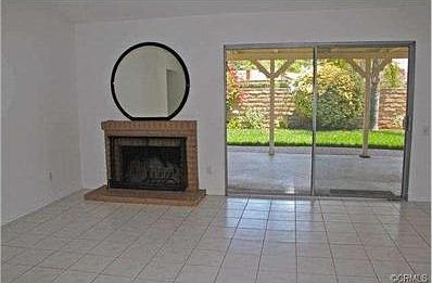 Spacious living room with sliding door access to a huge covered