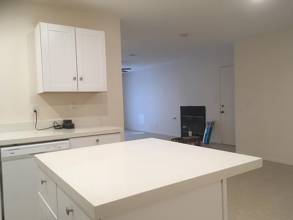 Kitchen open to dining and living