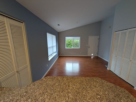 Living room and front door from kitchen