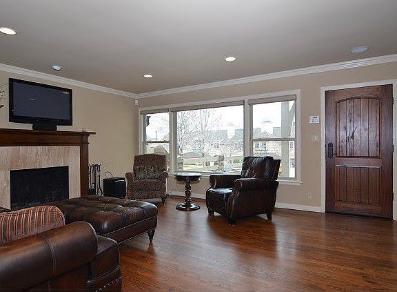 Classy and cozy living room with fireplace