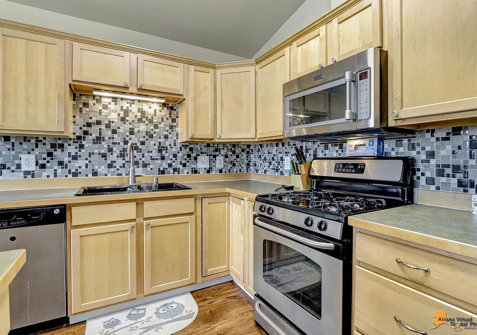 East Anchorage 3 Bedroom Home | Close to JBER! Attached Two Car Garage + Fenced in Yard — Photo 1