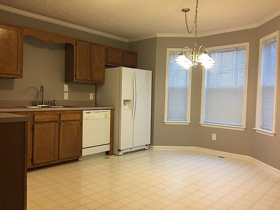 Kitchen view from living room and space for dining room tabl