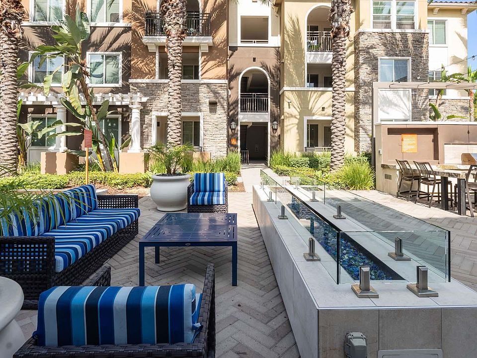 Kick back and socialize in the stylish outdoor lounge designed for comfort and connection.