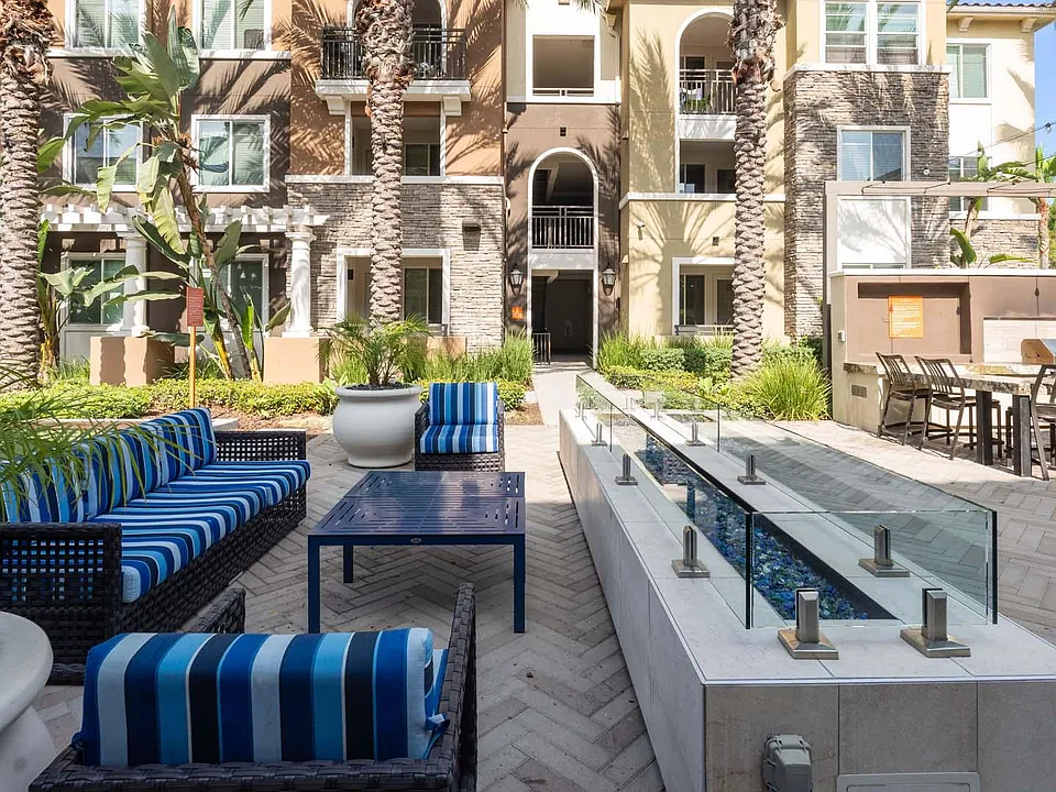 Kick back and socialize in the stylish outdoor lounge designed for comfort and connection.
