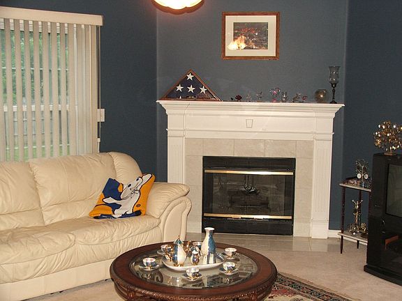 Living room with gas fireplace.