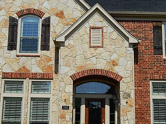 Beautiful Front Elevation of stone and brick.