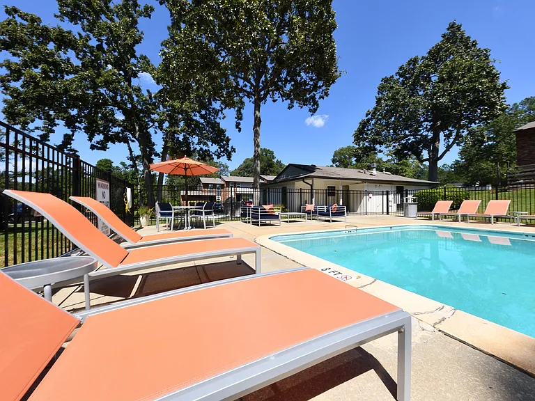 Pool area with lounge chairs