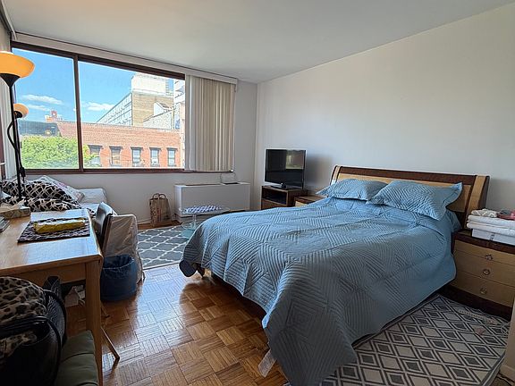 2nd image of 393 W 49th St APT 4K