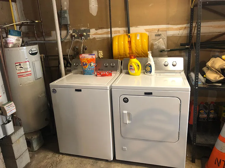 Washer dryer in heated garage.