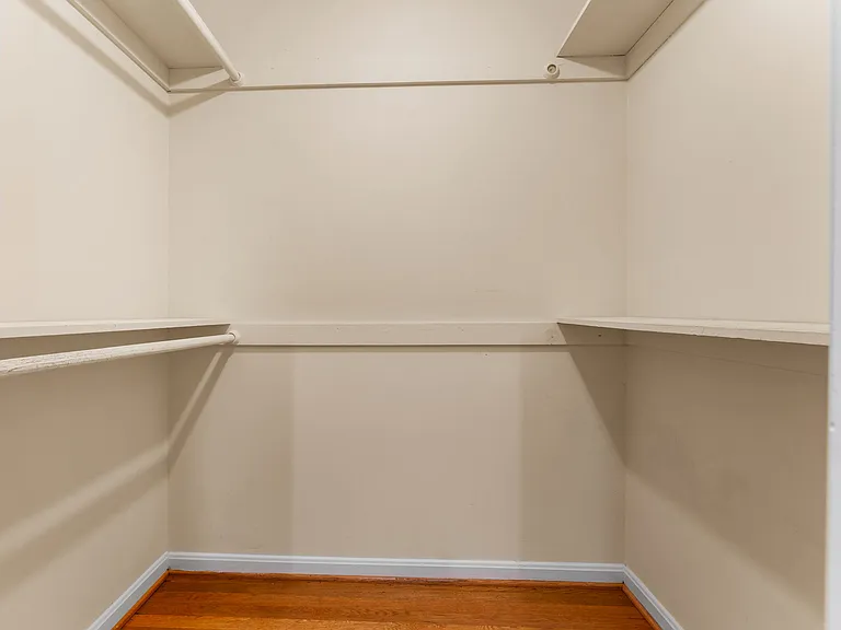 Separate "his" master bedroom closet