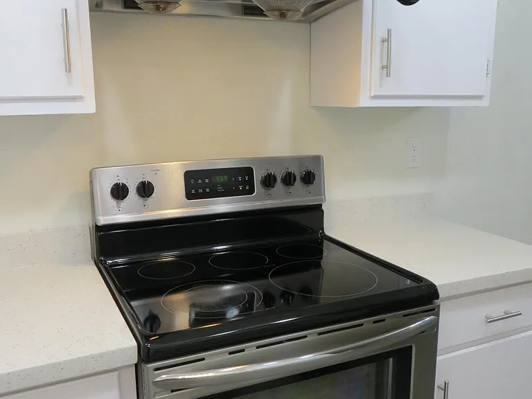 Kitchen, new Sakura fan/hood, newer kitchen stove, new quart