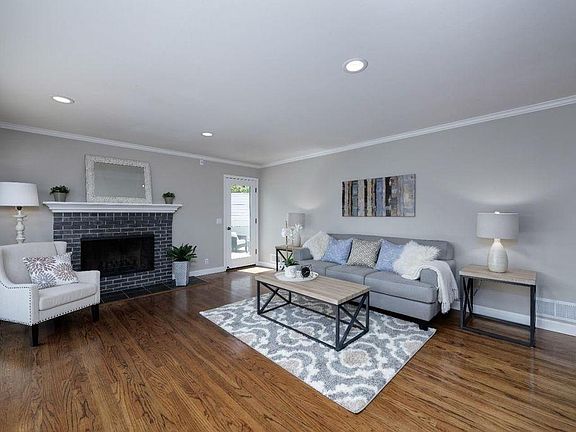 Living room, fireplace, patio access