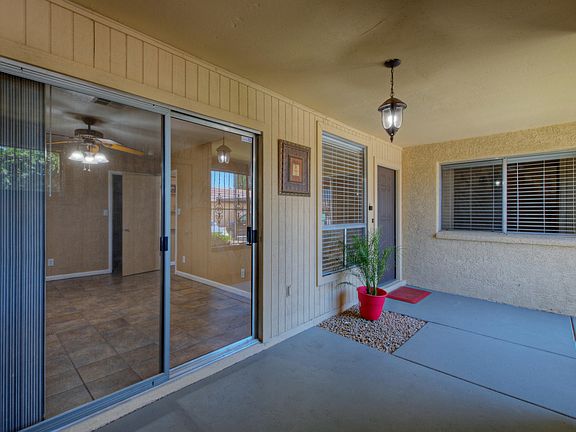 9025 W El-005-13-Front Por-MLS_Size