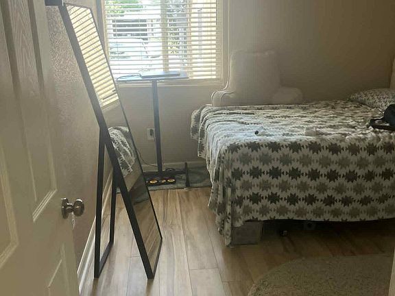 Entrance to private bedroom. Mirror, bed, and dresser can be included.