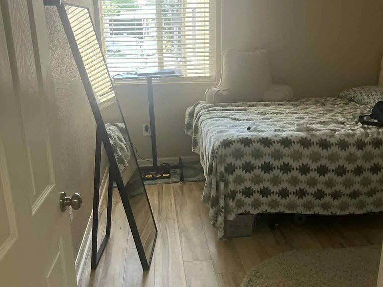 Entrance to private bedroom. Mirror, bed, and dresser can be included.