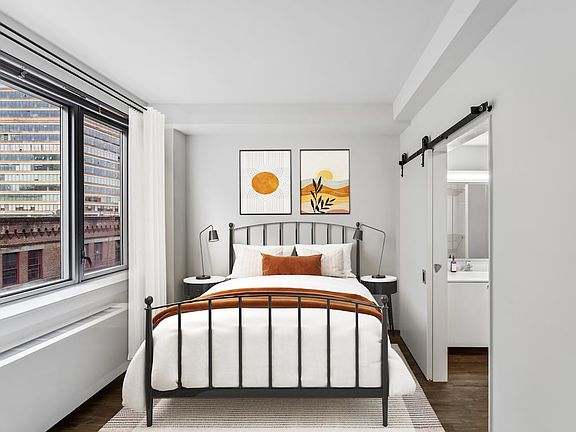 Bedroom with hard surface flooring