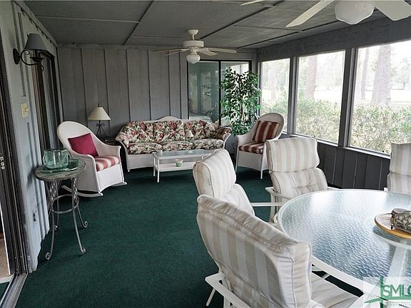 Screened porch with golf views