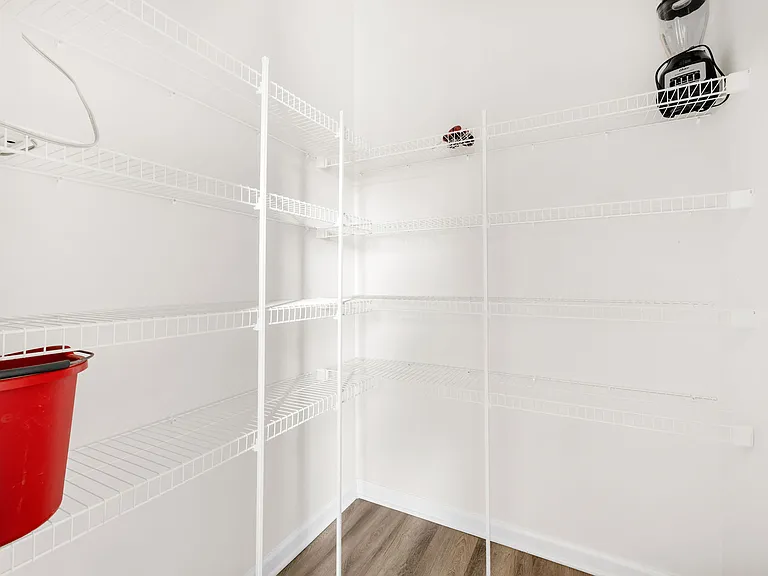 Large, walk-in pantry to shelving.
