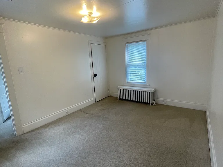 Fresh bedroom 2 with extra long closet.