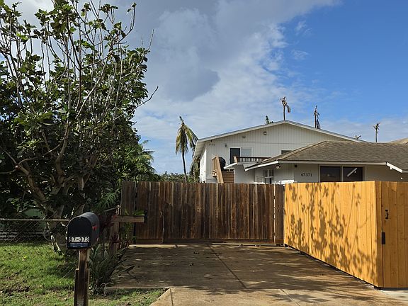 Entrance to property with automatic gate