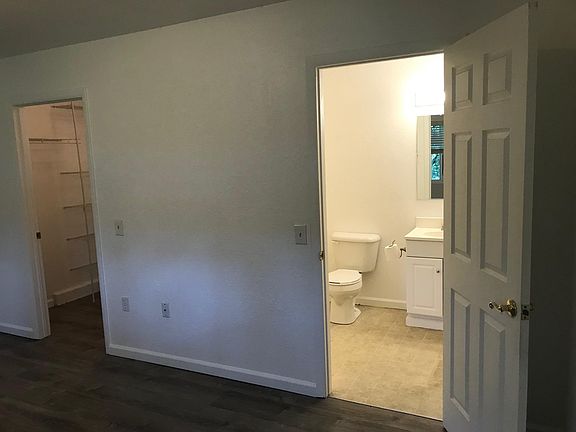 Bathroom connects off bedroom and hall.