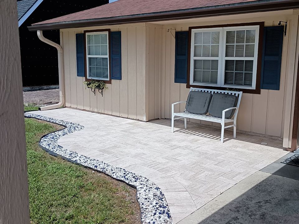 Front Patio and 2 Car Carport