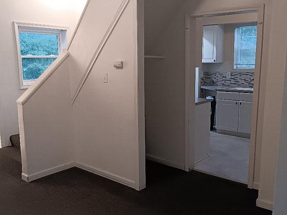 Open View: Kitchen, Living Room, Stairway