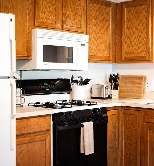 Microwave, natural gas range and oven